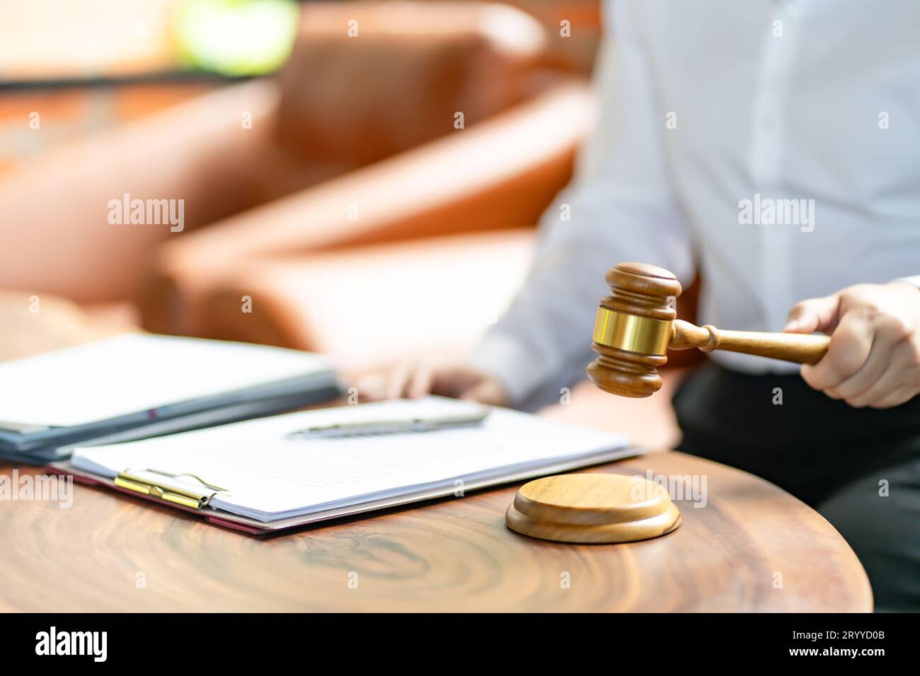 Lawyer Legal counsel presents to bid sale judgment mallet with judge. Stock Photo