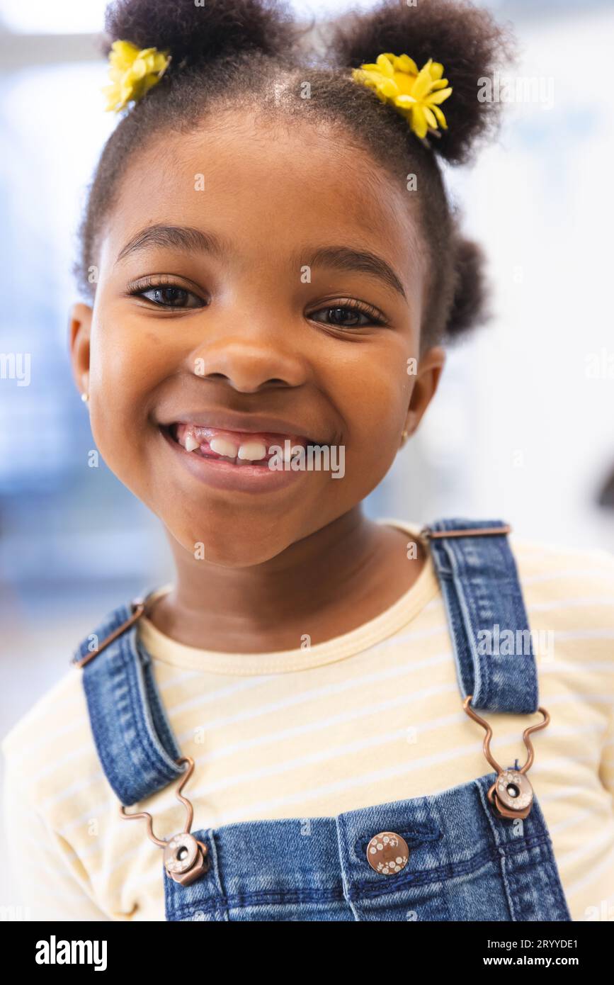 Portrait of happy african american girl patient in waiting room at ...