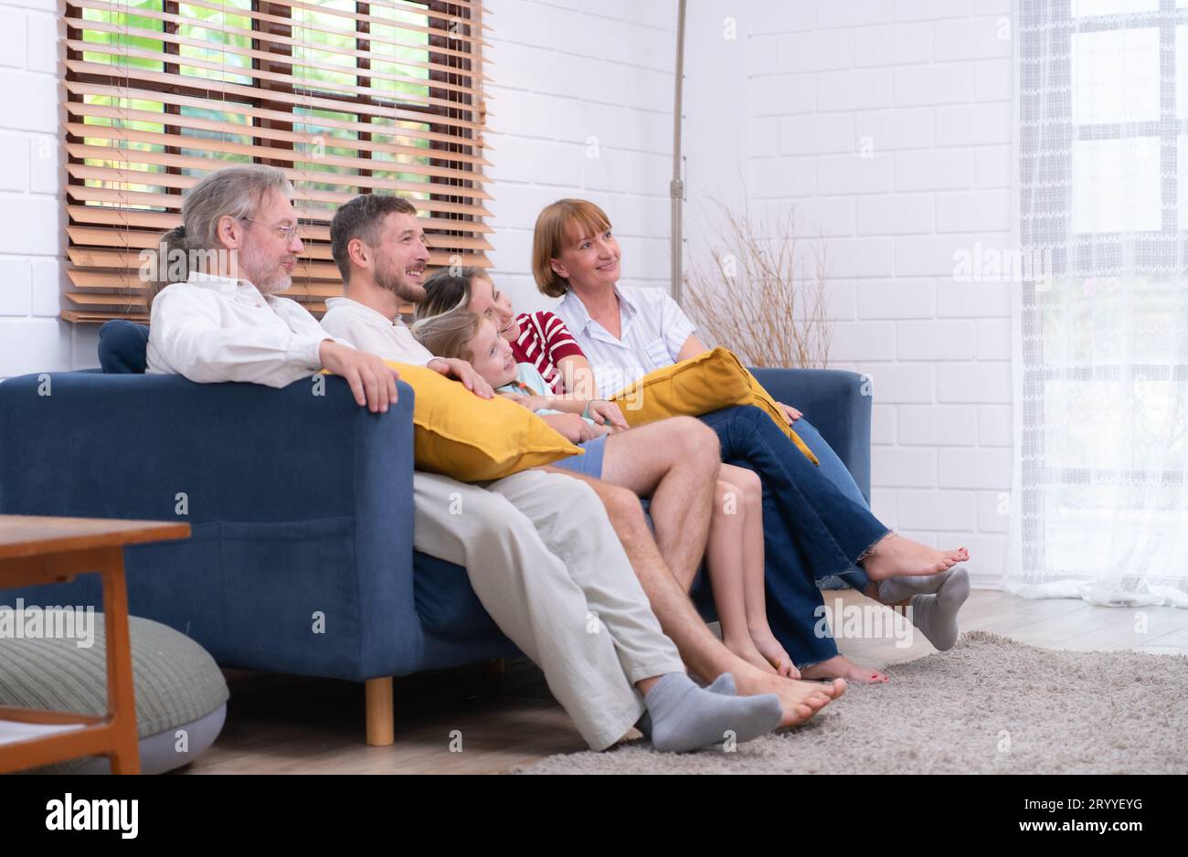 Happiness and fun of a big family who gather to do activities at home