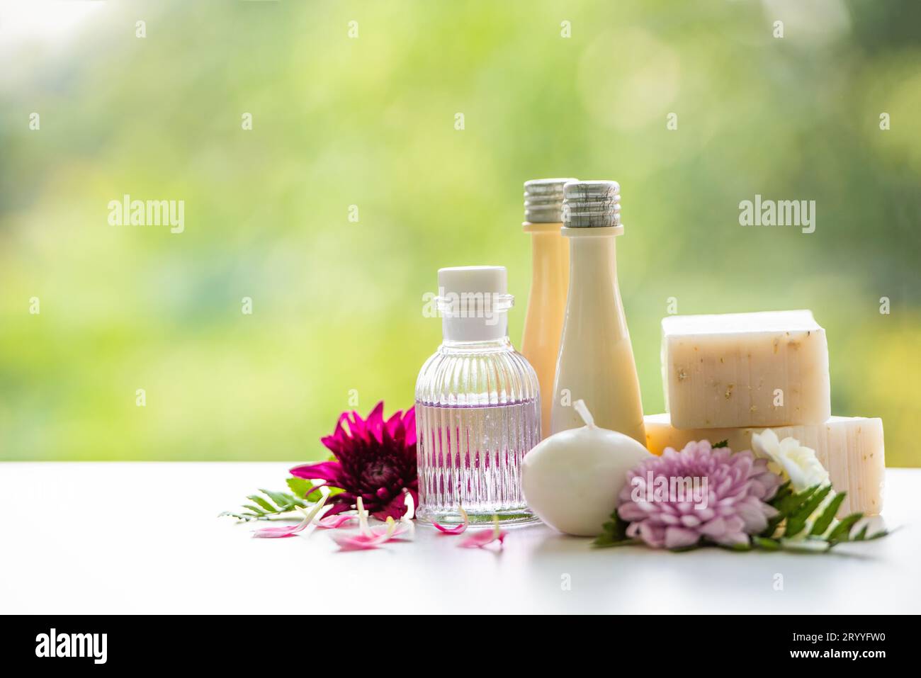 Floral spa treatments on white wooden table. Healthcare and body therapy massage relaxation concept. Beauty and Healthy theme. P Stock Photo