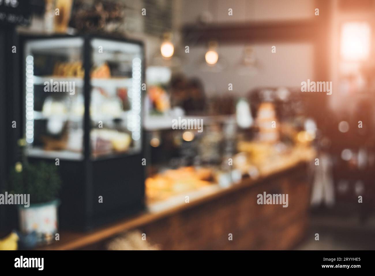 Blurry background of Bakery and coffee shop. Food and restaurant concept. Co working theme. Stock Photo