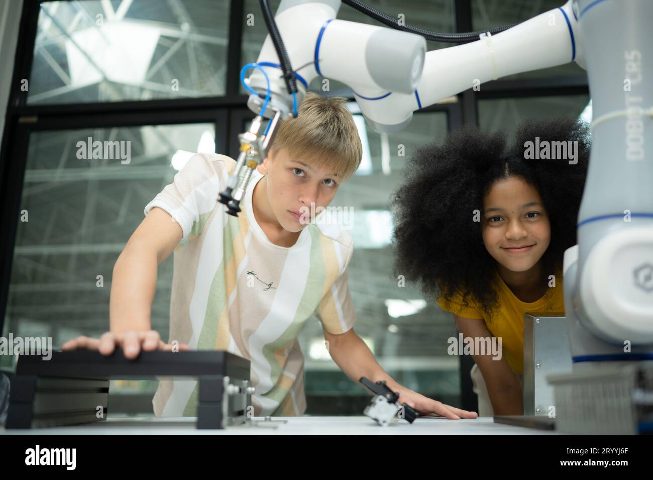 Children using the hand robot technology, Students are studying technology, which is one of the STEM courses. Stock Photo
