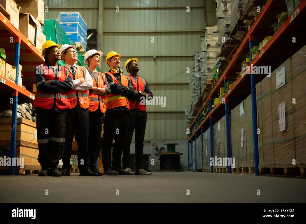 Portrait of Group employees in a warehouse, Consisting of Warehouse supervisors Distribution Manager and Warehouse Specialist Stock Photo