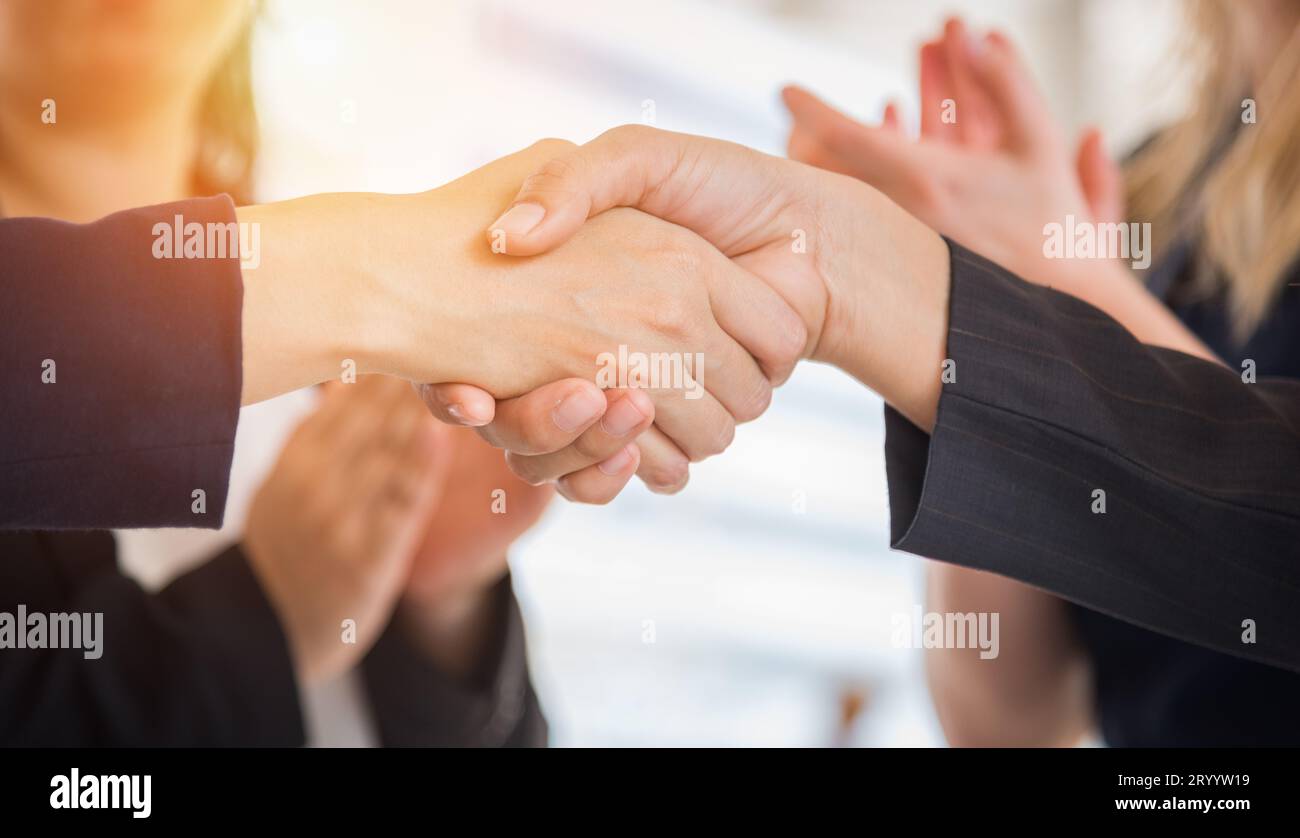 Business people shaking hands after finish reach agreement for startup new project. Negotiating and Happy working concept. Hands Stock Photo