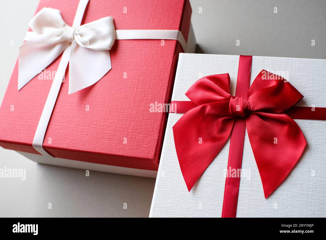 Valentine present. Gift box and red ribbon for romantic couple Gift box ...
