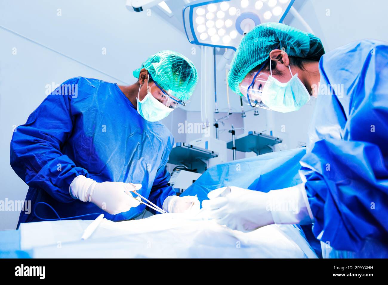 Doctor and assistant nurse operating for help patient from dangerous emergency case, Hospital and Surgery Concept, Health care a Stock Photo