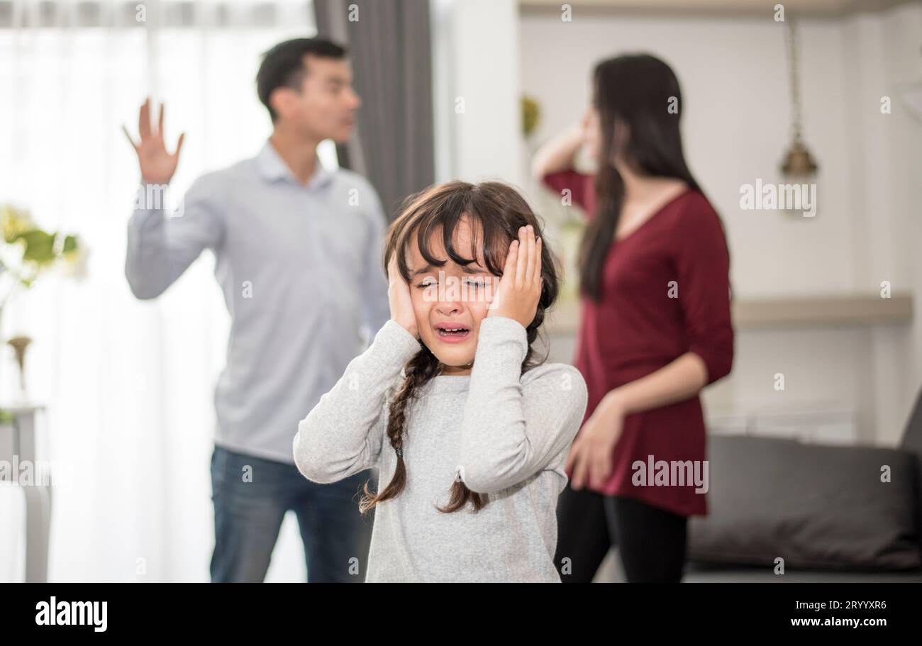 Little girl was crying because dad and mom quarrel, Sad and dramatic ...
