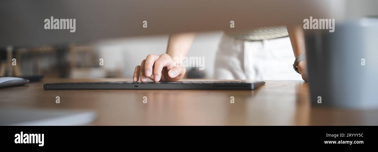Happy young Asian Woman working on computer Business Data Analyst Stock Photo