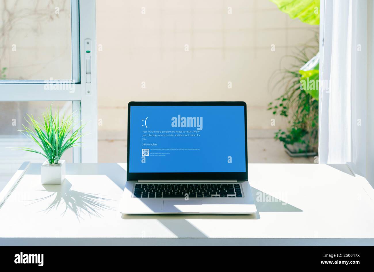 Laptop showing Blue screen of death or BSOD on the monitor screen. Faulty Microsoft operating system Windows 10. Rosario, Argentina - December 23, 202 Stock Photo