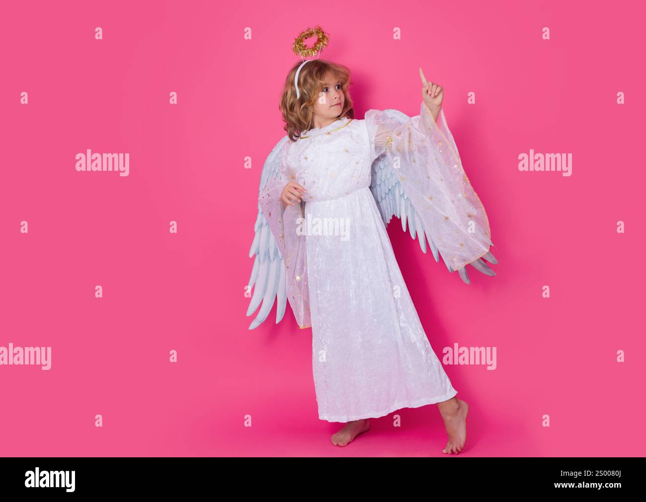 Angel Point Hand Child angel pointing finger, point gesture. Little angel. Portrait of ...