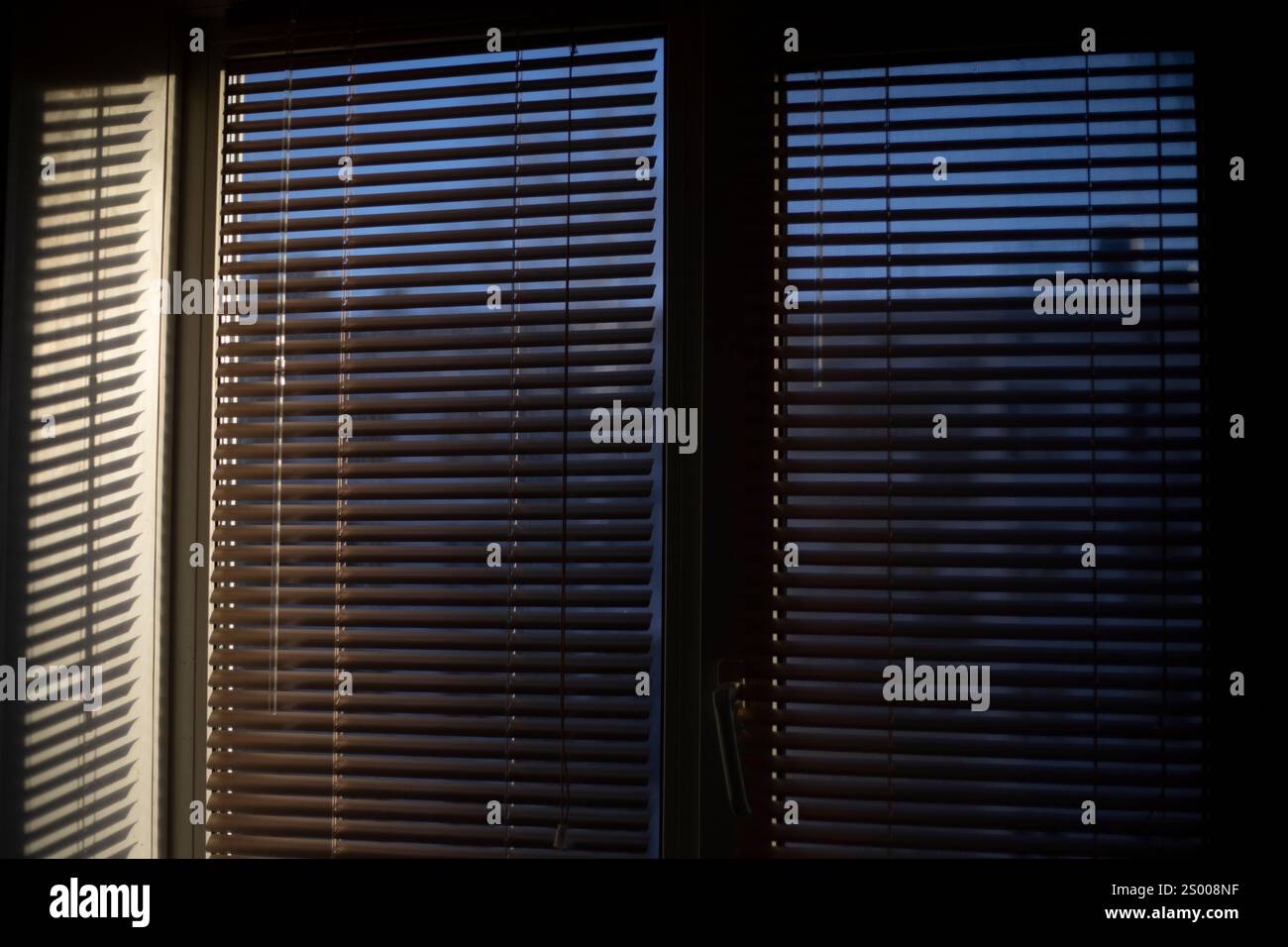 Light through the blinds. Window details. Interior of the apartment ... - Penthouse Apartment Natural Light Filtered Through Blinds