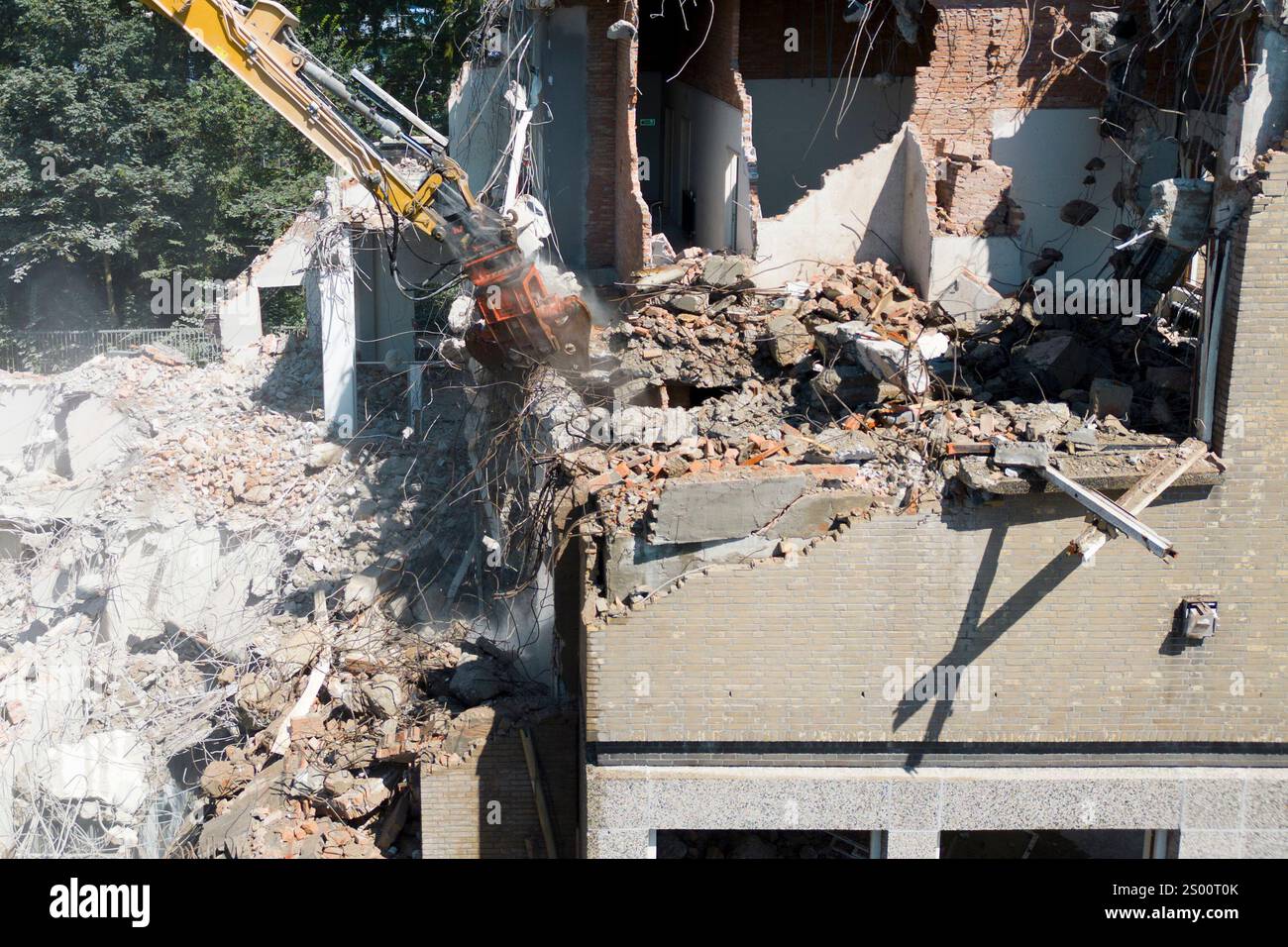 Aerial view of buildings being demolished by heavy machinery Stock ...