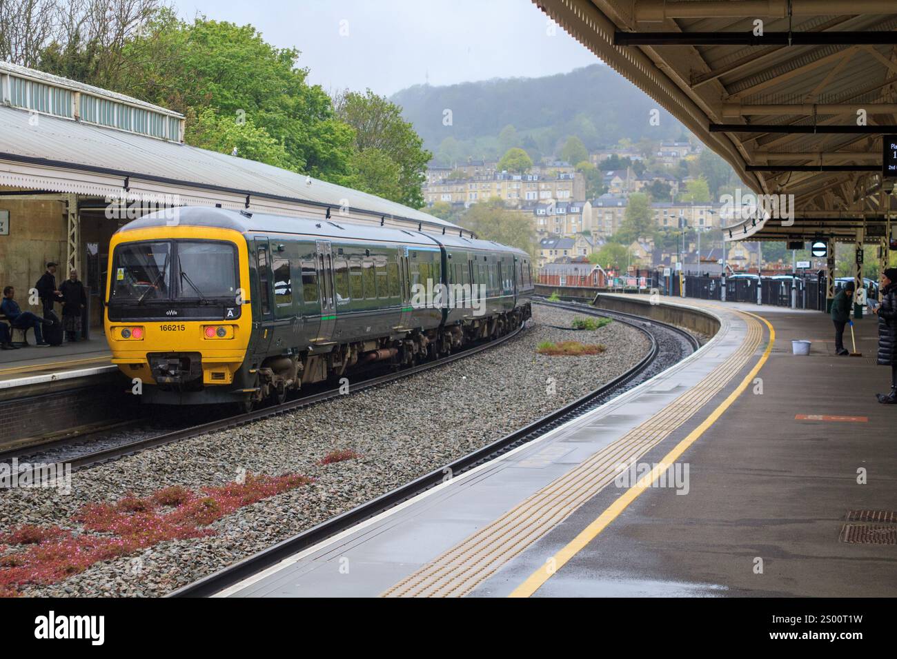 27 April 2024. A train coming into Bath Spa Railway Station in Somerset ...