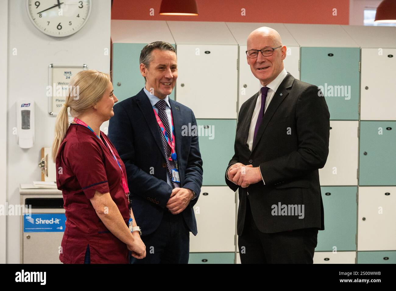 First Minister John Swinney with Patrick Rafferty Assistant Director of ...