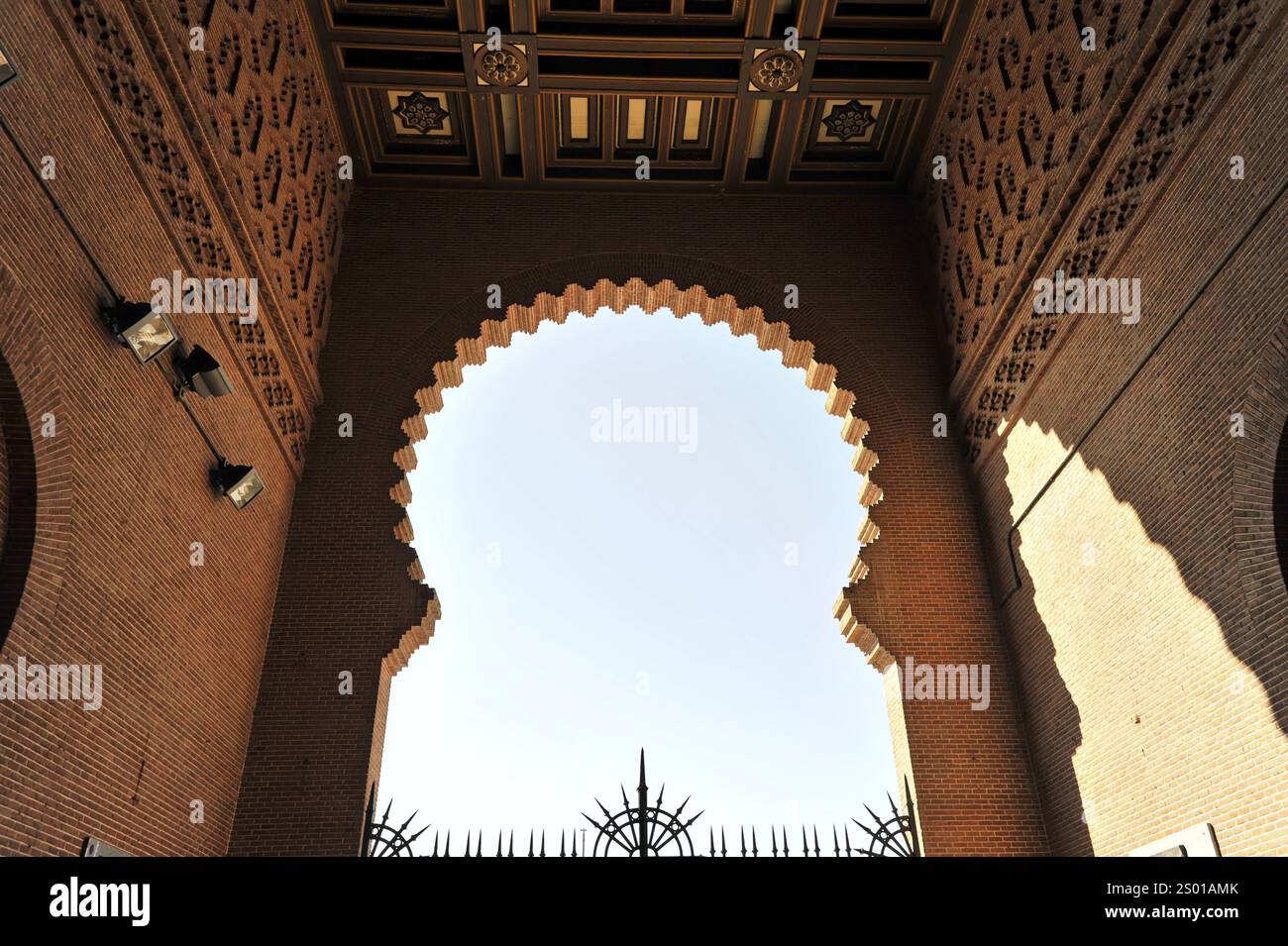 Madrid, Spain, Europe, Moorish-style entrance gate with detailed architectural patterns and a view of the sky, Las Ventas bullring, Plaza de Toros Las Stock Photo