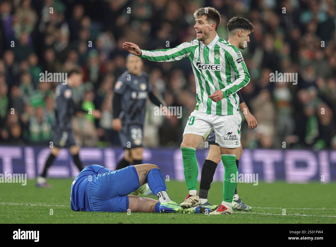 Giovani Lo Celso of Real Betis and Augusto Batalla of Rayo Vallecano ...