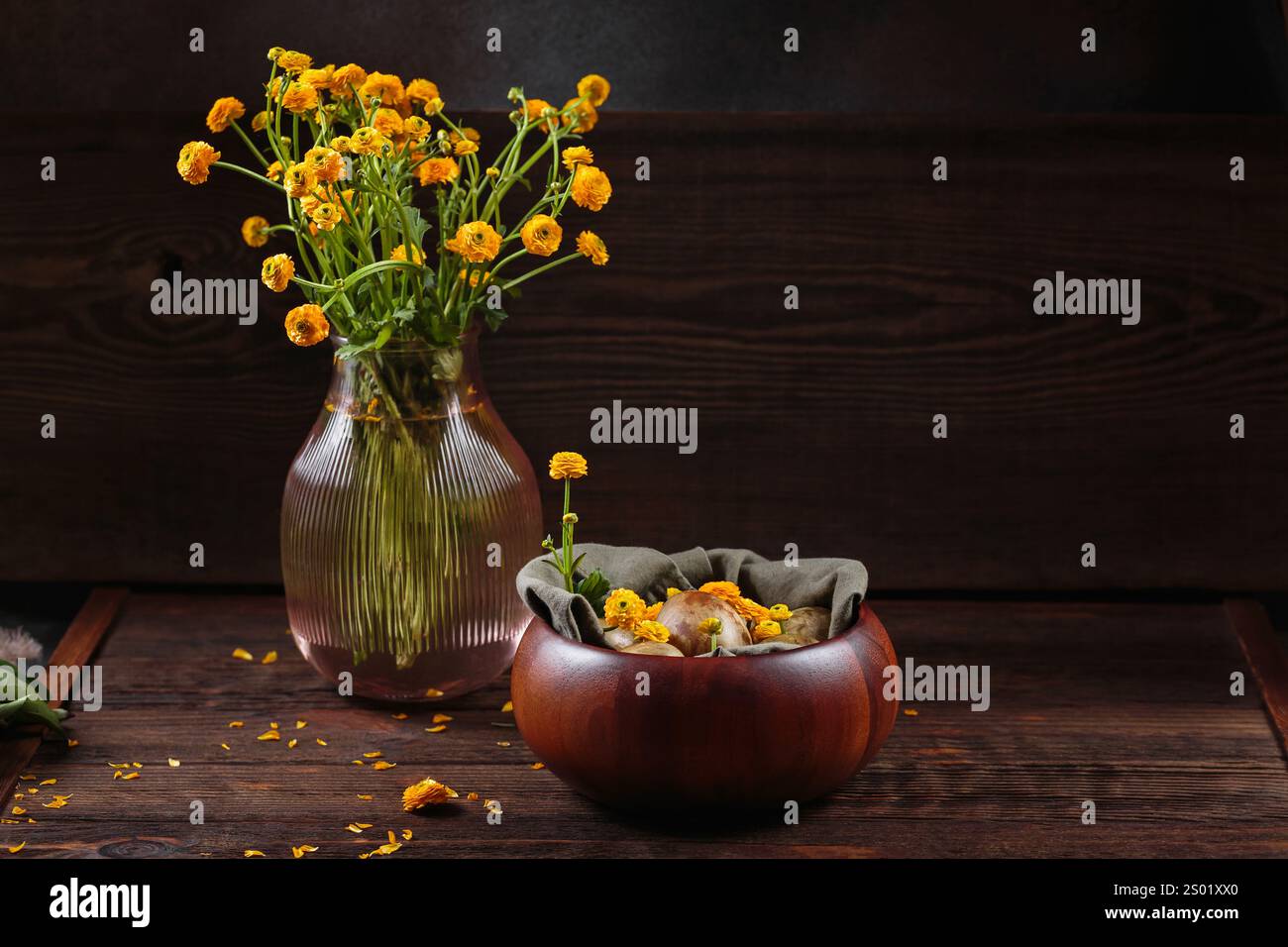 Easter still life with yellow flowers and dyed eggs Stock Photo - Alamy