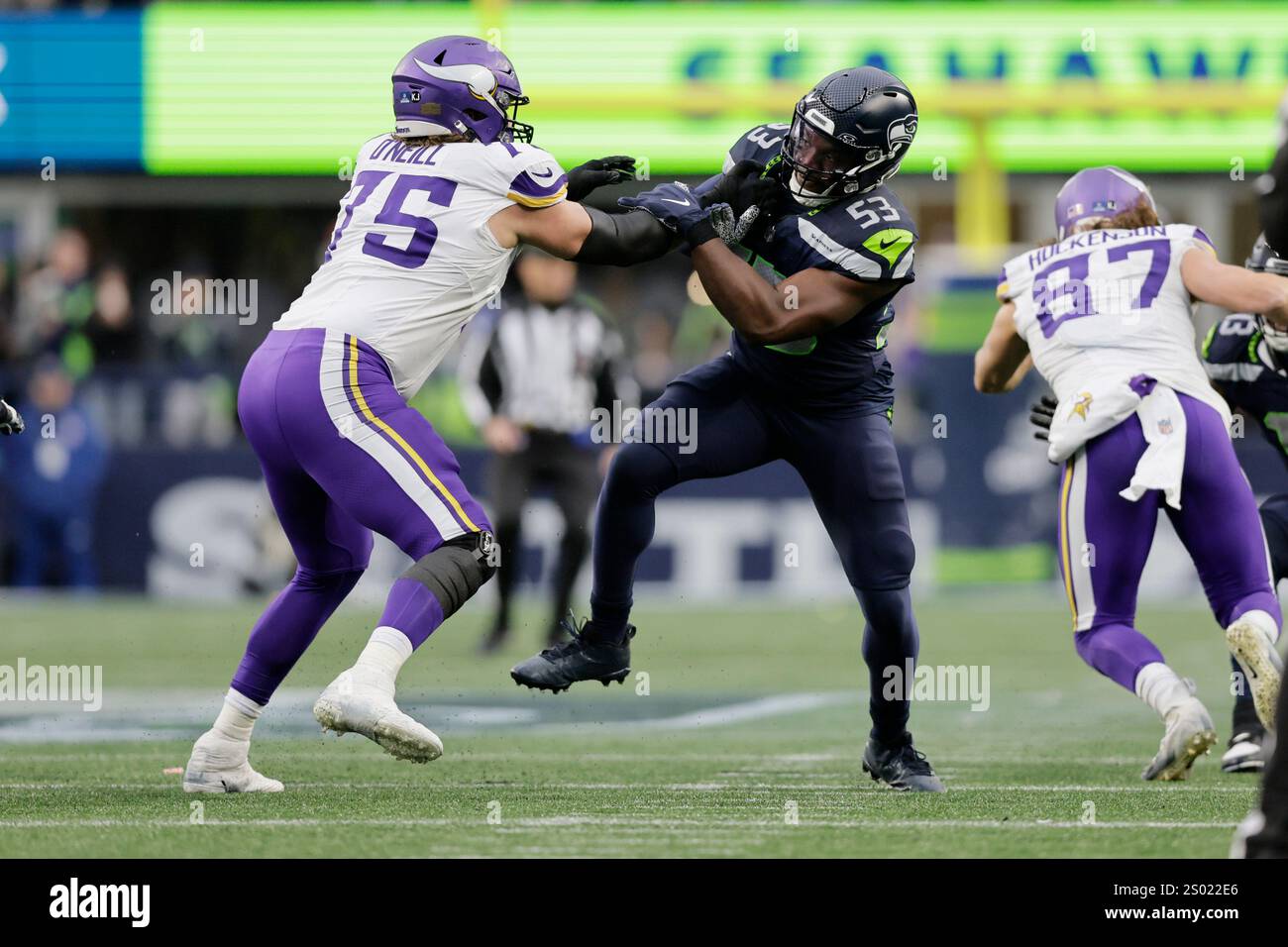 Seattle Seahawks linebacker Boye Mafe (53) is blocked by Minnesota