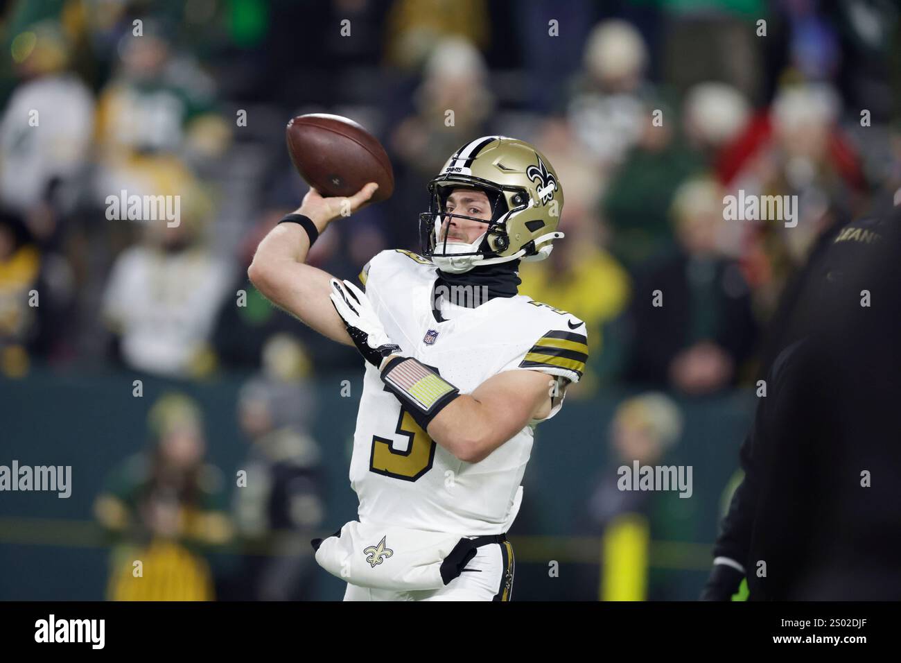 New Orleans Saints quarterback Jake Haener (3) warms up before an NFL