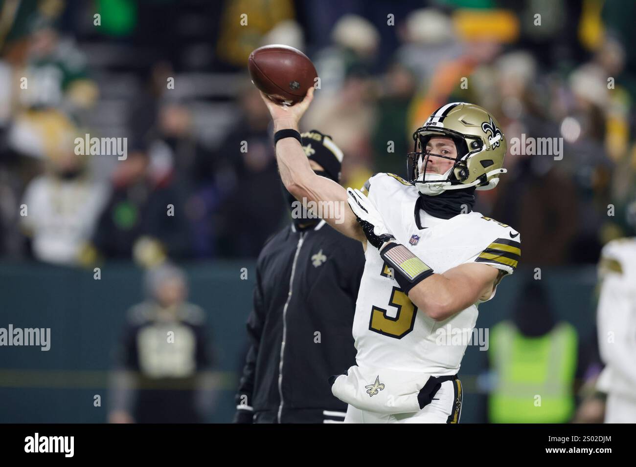 New Orleans Saints quarterback Jake Haener (3) warms up before an NFL