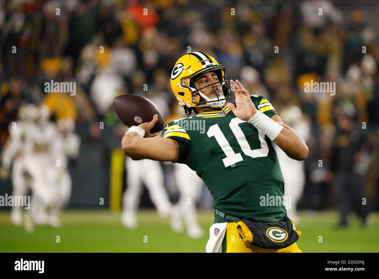 New Orleans Saints quarterback Jake Haener (3) warms up before an NFL