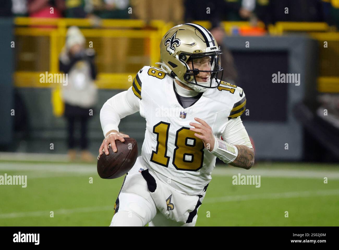 New Orleans Saints quarterback Spencer Rattler (18) scrambles during