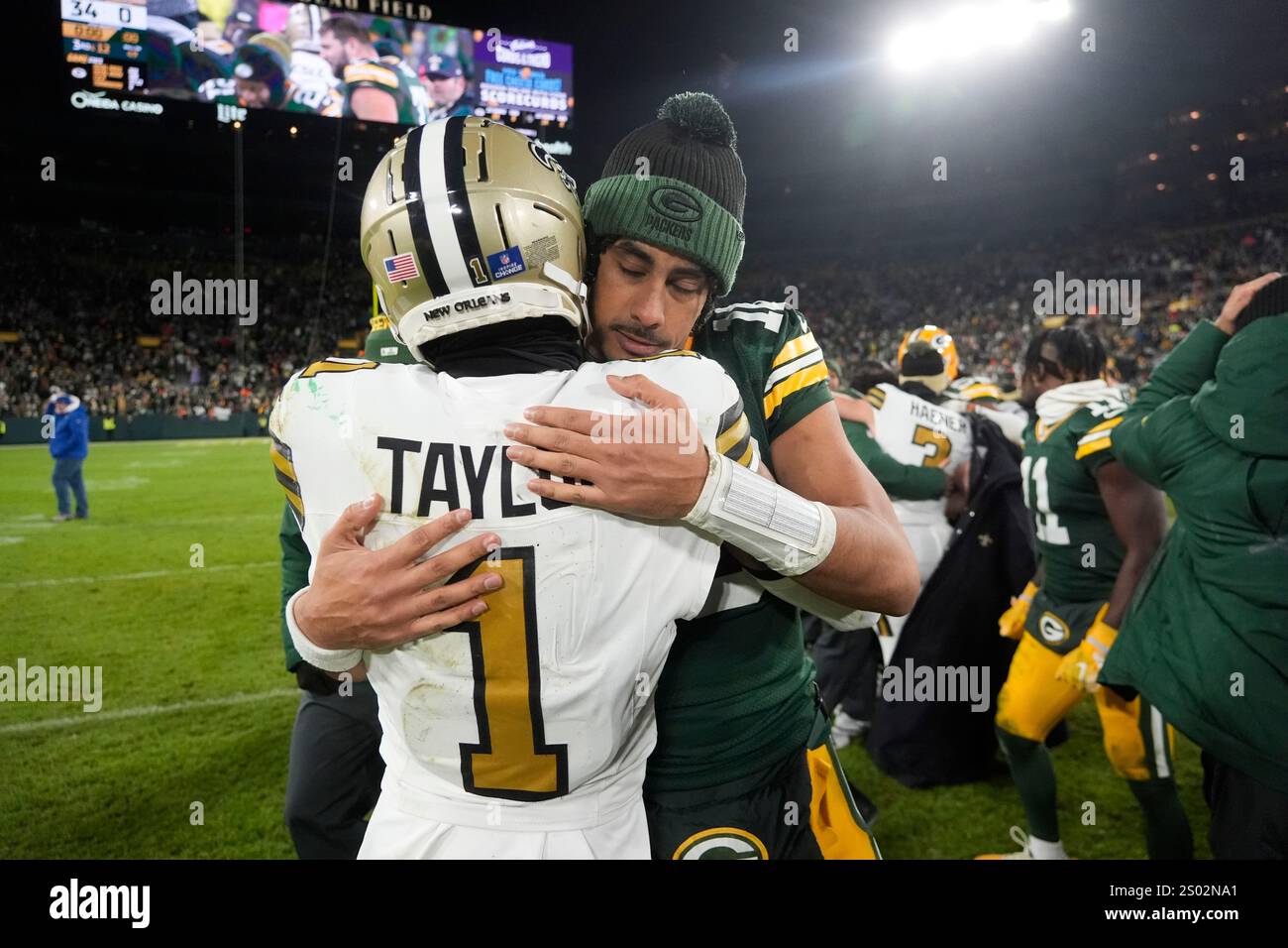 New Orleans Saints cornerback Alontae Taylor (1) greets Green Bay