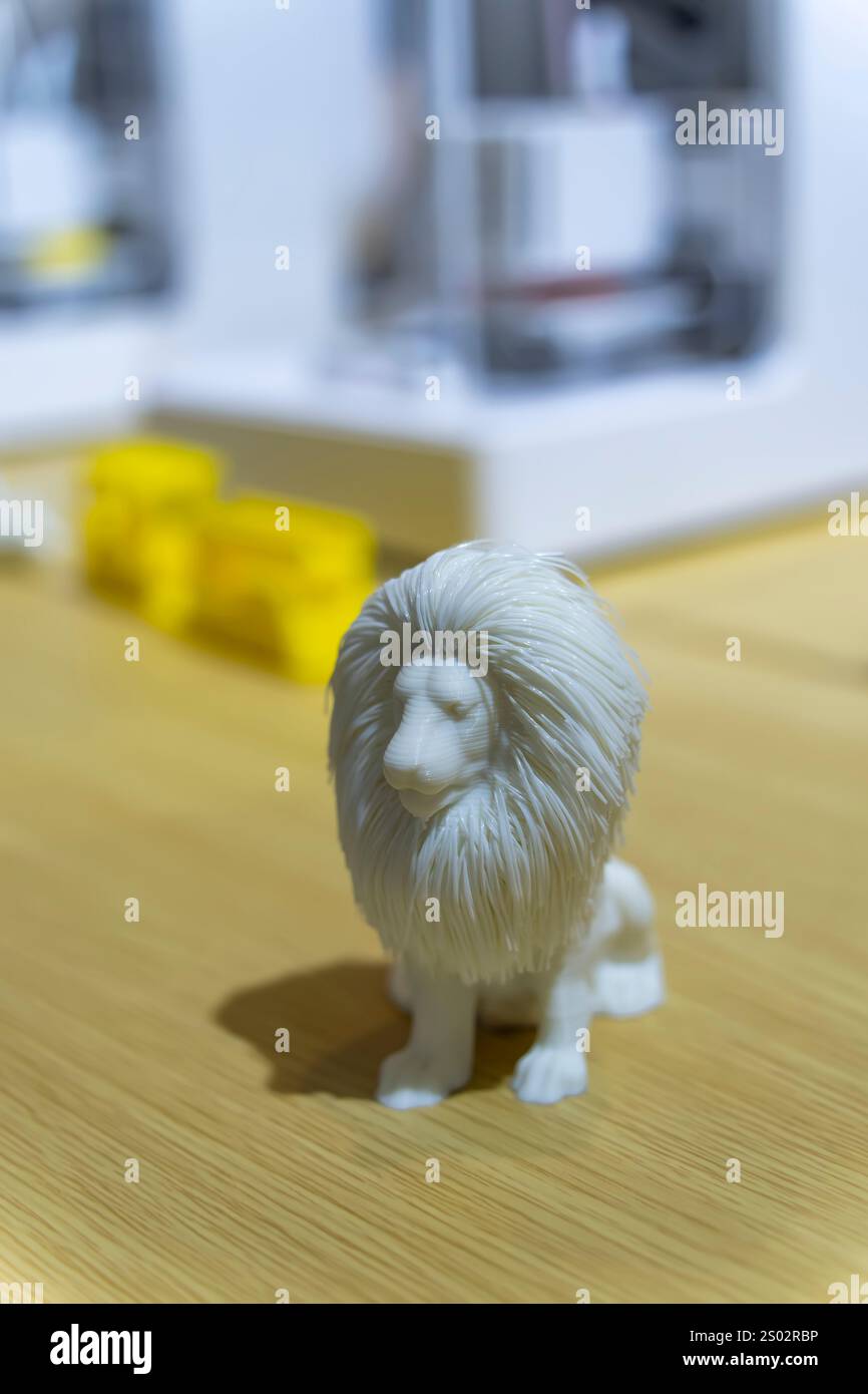 3D printer printing lion figure close-up. Stock Photo