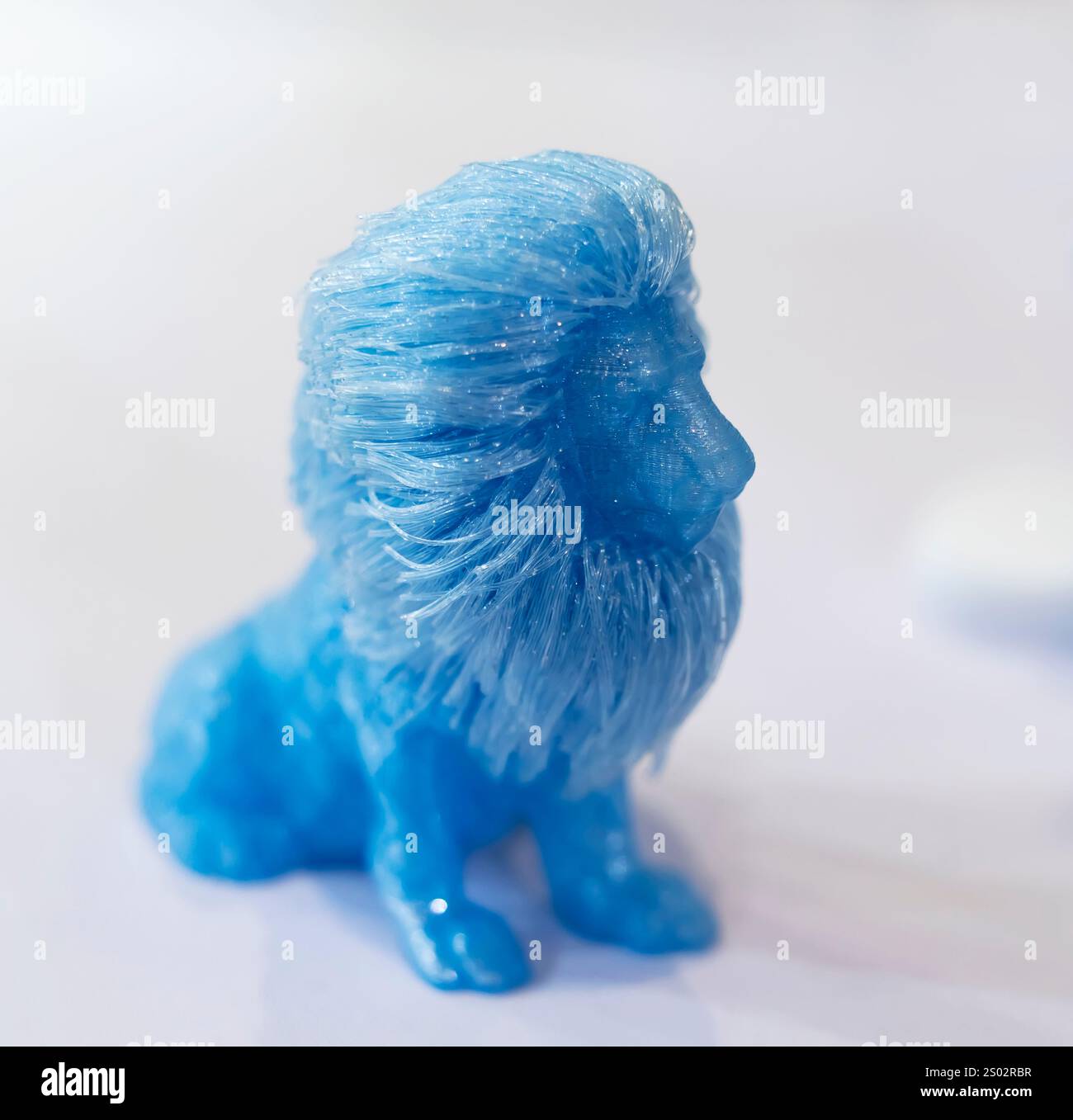 3D printer printing lion figure close-up. Stock Photo
