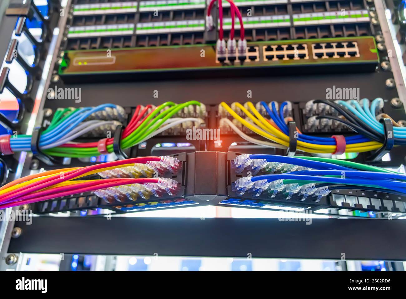 network cable connecting on network core switch close up Stock Photo ...
