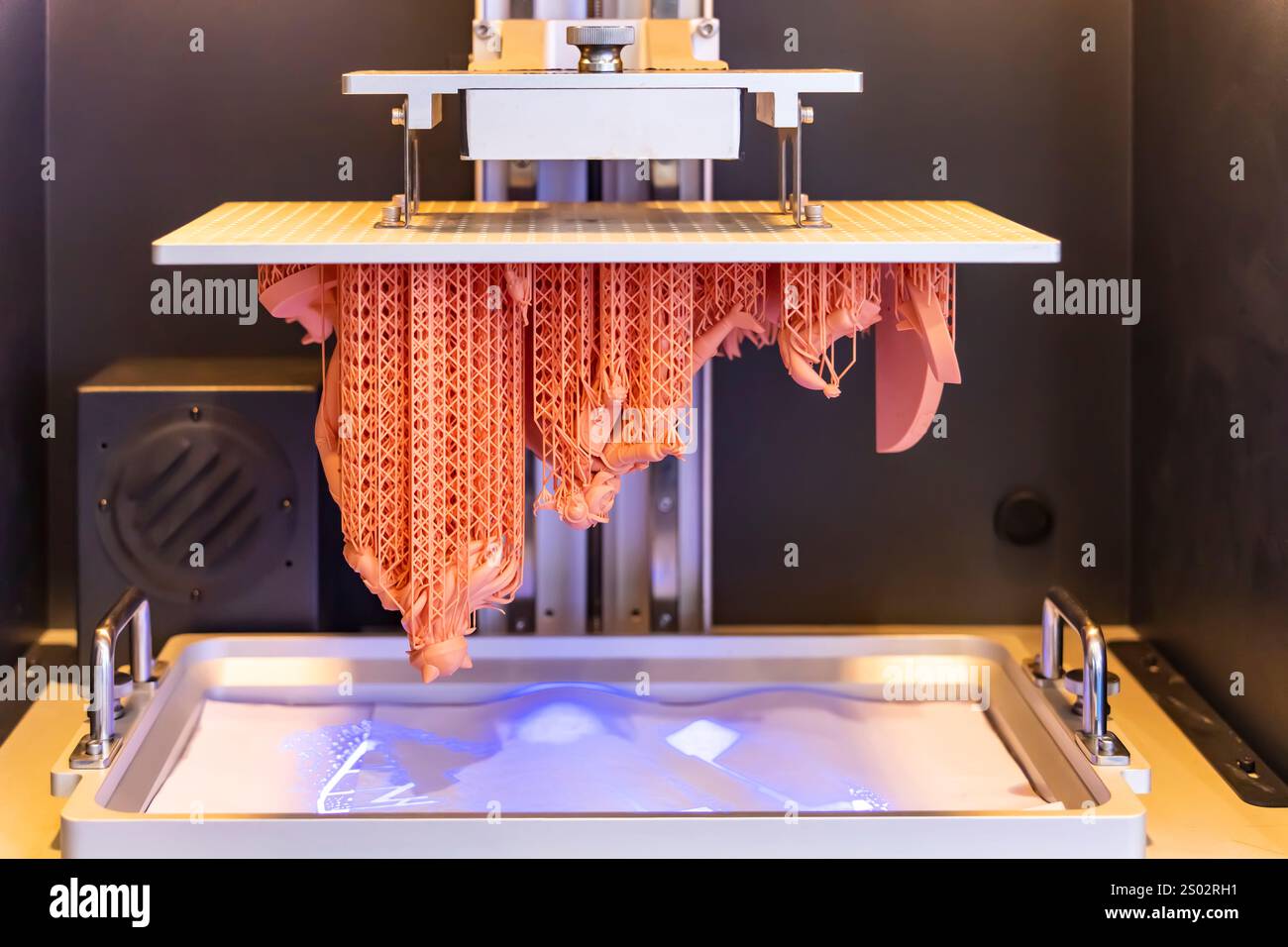 Stereolithography DPL 3d printer create small detail and liquid drips Stock Photo