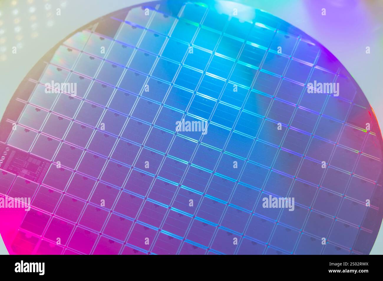 Silicon Wafers with microchips used in electronics for the fabrication ...