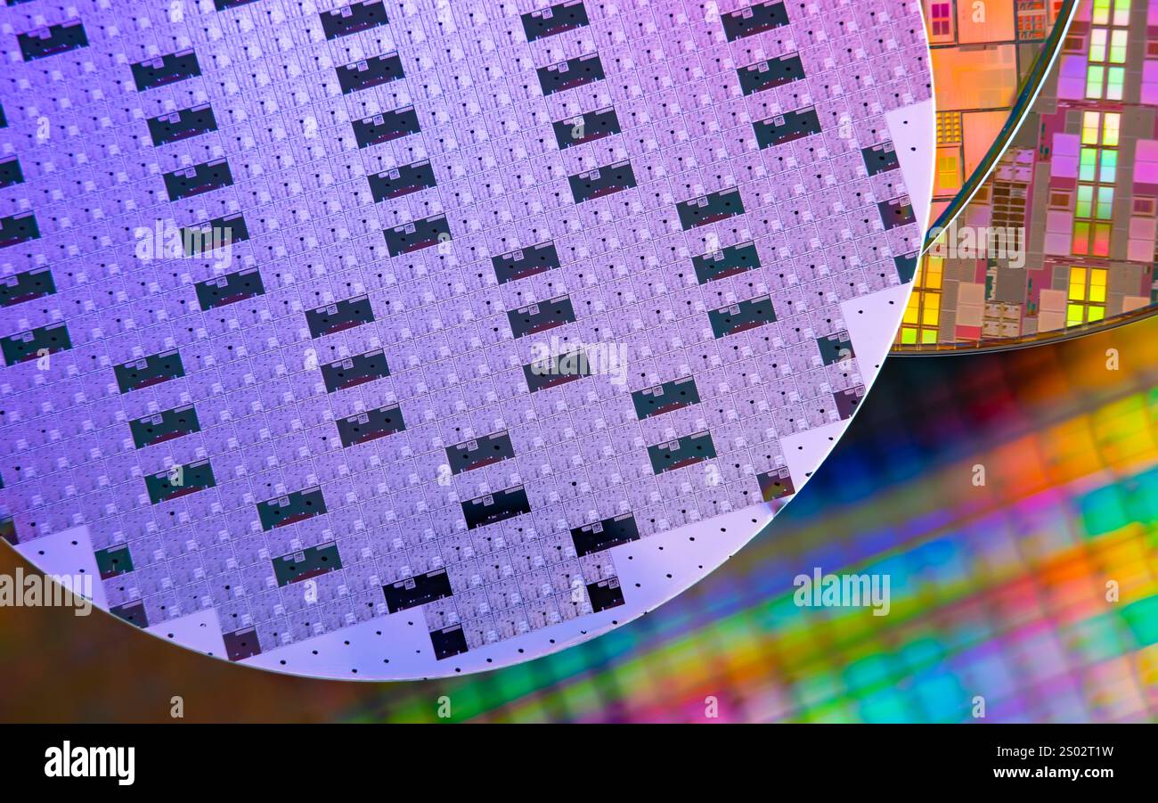 Silicon Wafers with microchips used in electronics for the fabrication ...