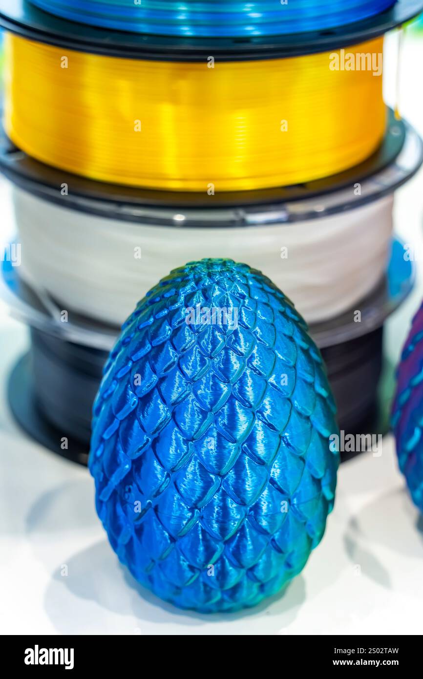 colorful plastic model of egg printed on a 3D printer Stock Photo