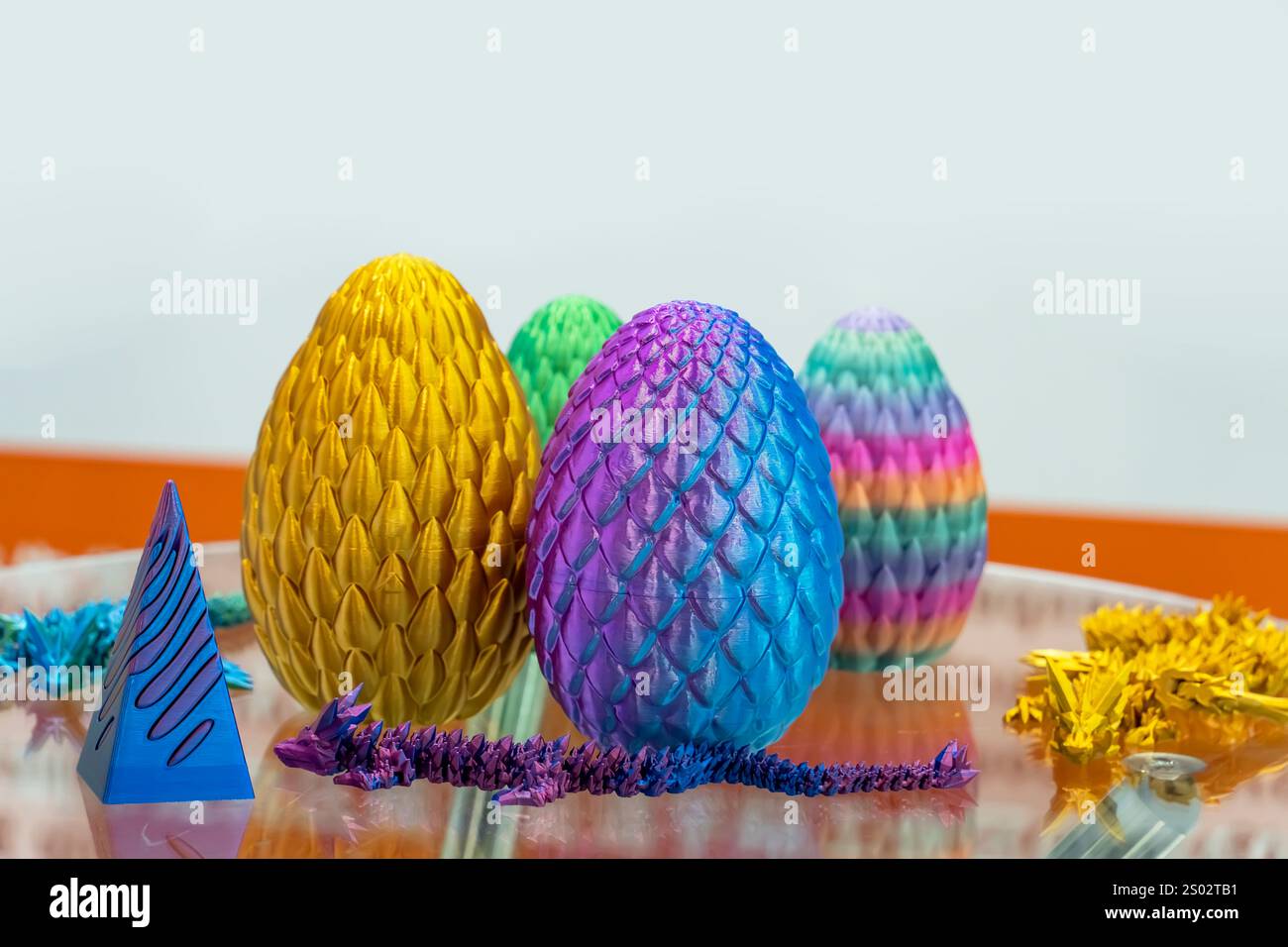 colorful plastic model of egg printed on a 3D printer Stock Photo