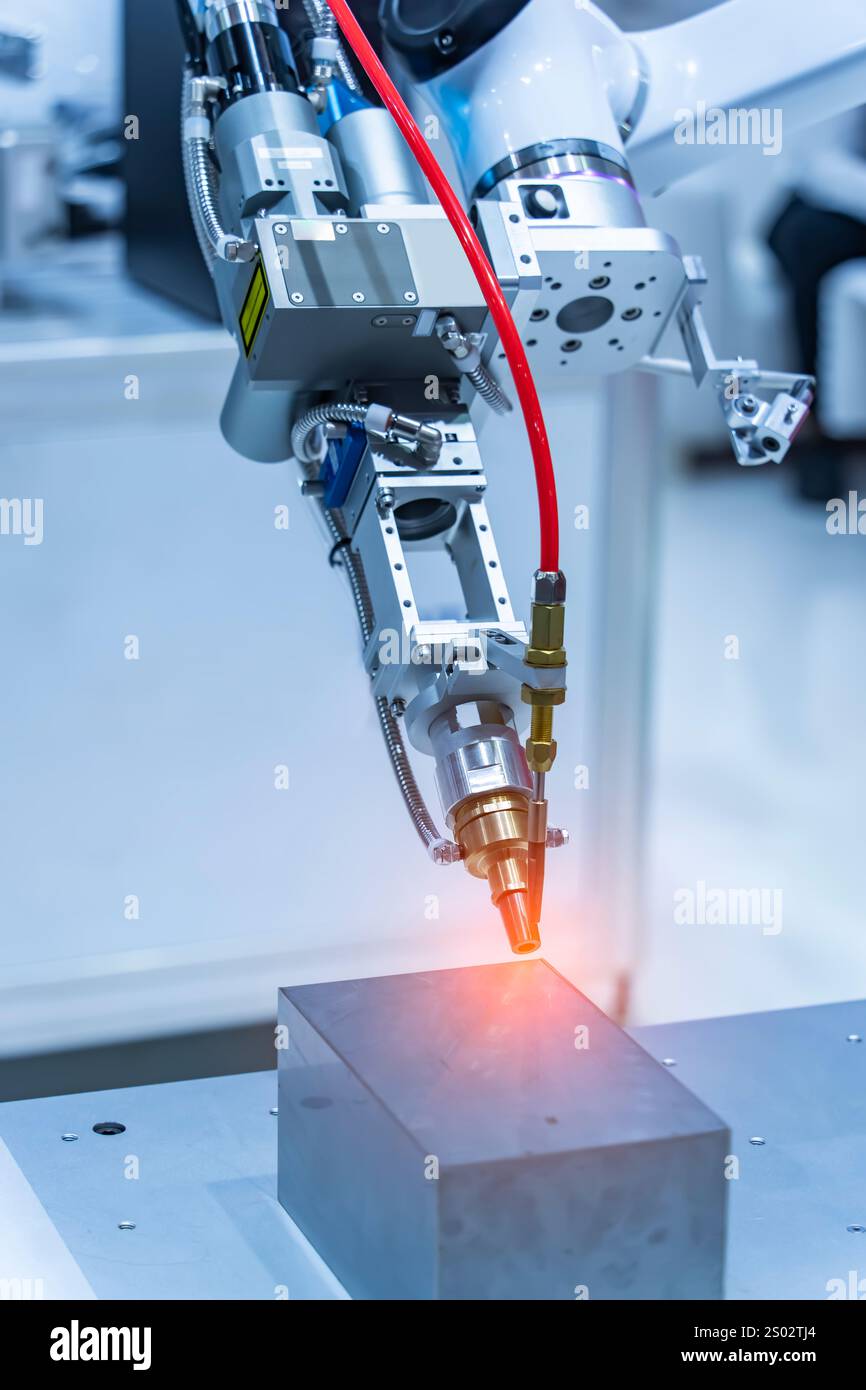 Robotic Welding Machine in a Metal Manufacturing Plant Stock Photo