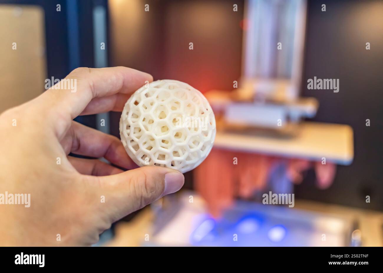 hand with Object printed on 3d printer close-up Stock Photo