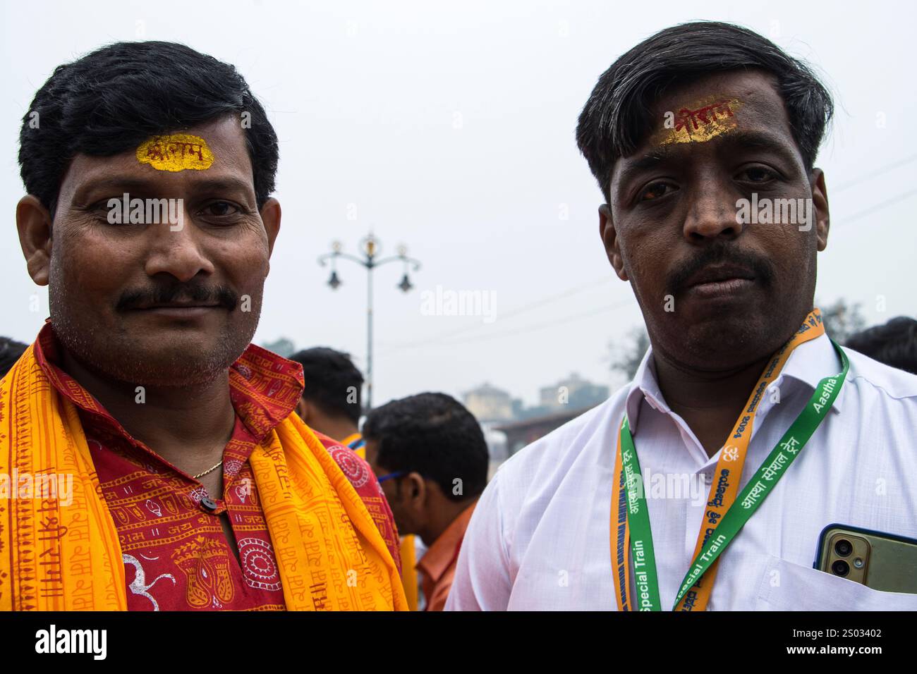 Pilgrims with “Shri Ram” Tilaka, forehead marking. Ram Janmabhoomi pathAyodhya, UP, India Stock Photo