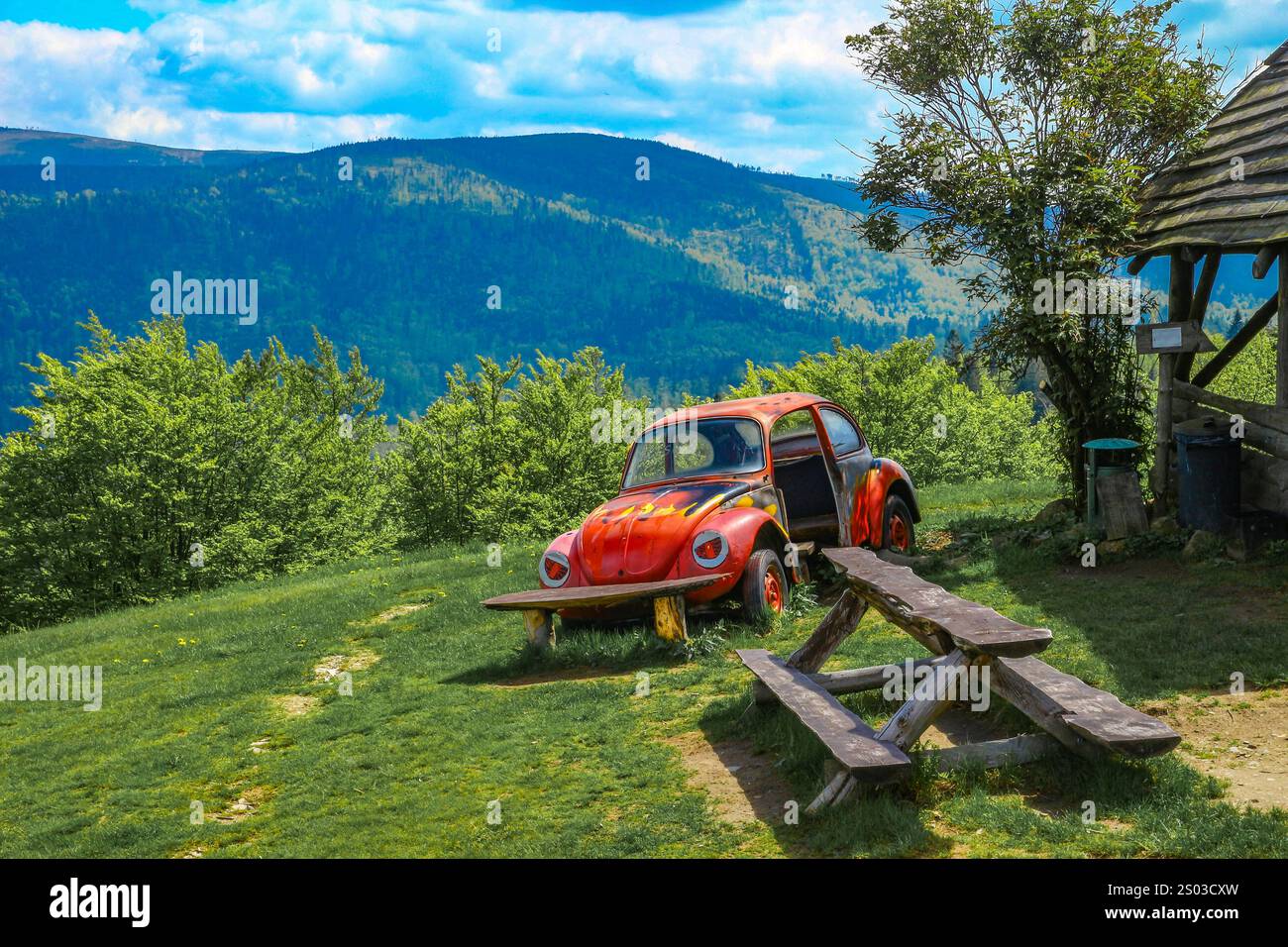 Mountain landscape - panorama of mountains, mountain shelter in the Silesian Beskids, Telesforówka, wreck of an old abandoned car as an attraction for Stock Photo