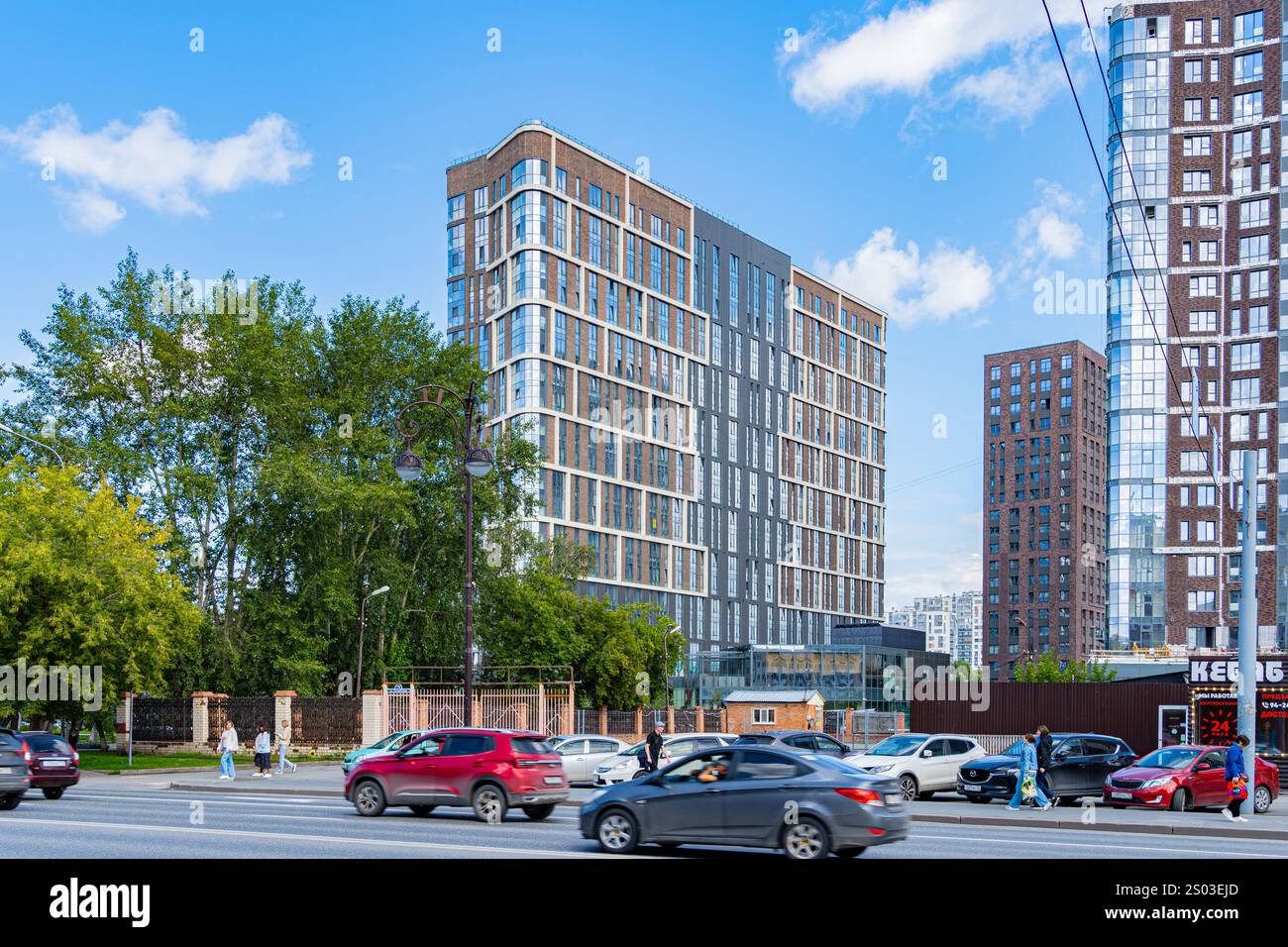 New building facade in housing complex. Modern style in architecture ...