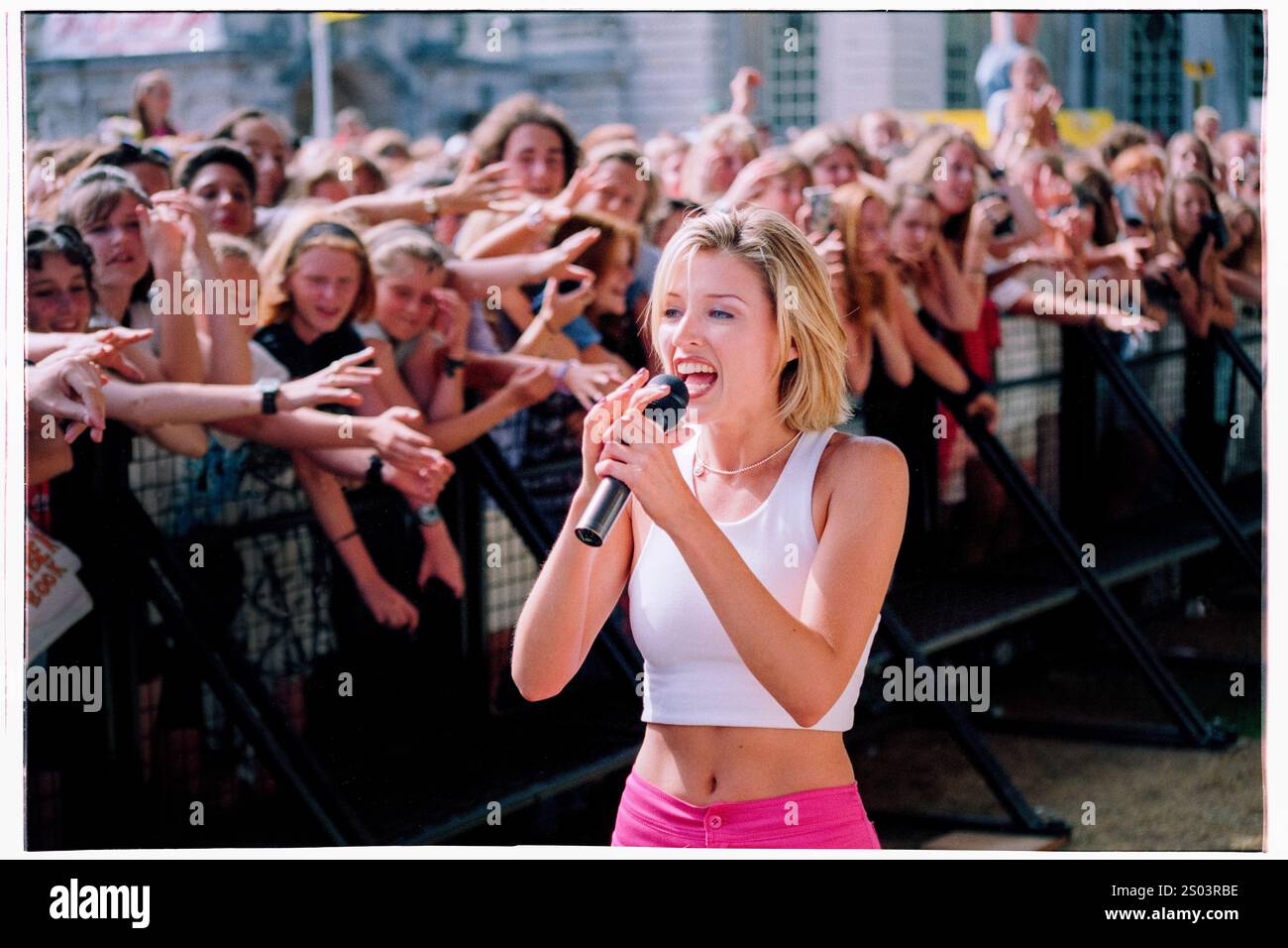 DANNII MINOGUE, CONCERT, 1995: A young Dannii Minogue performing at ...