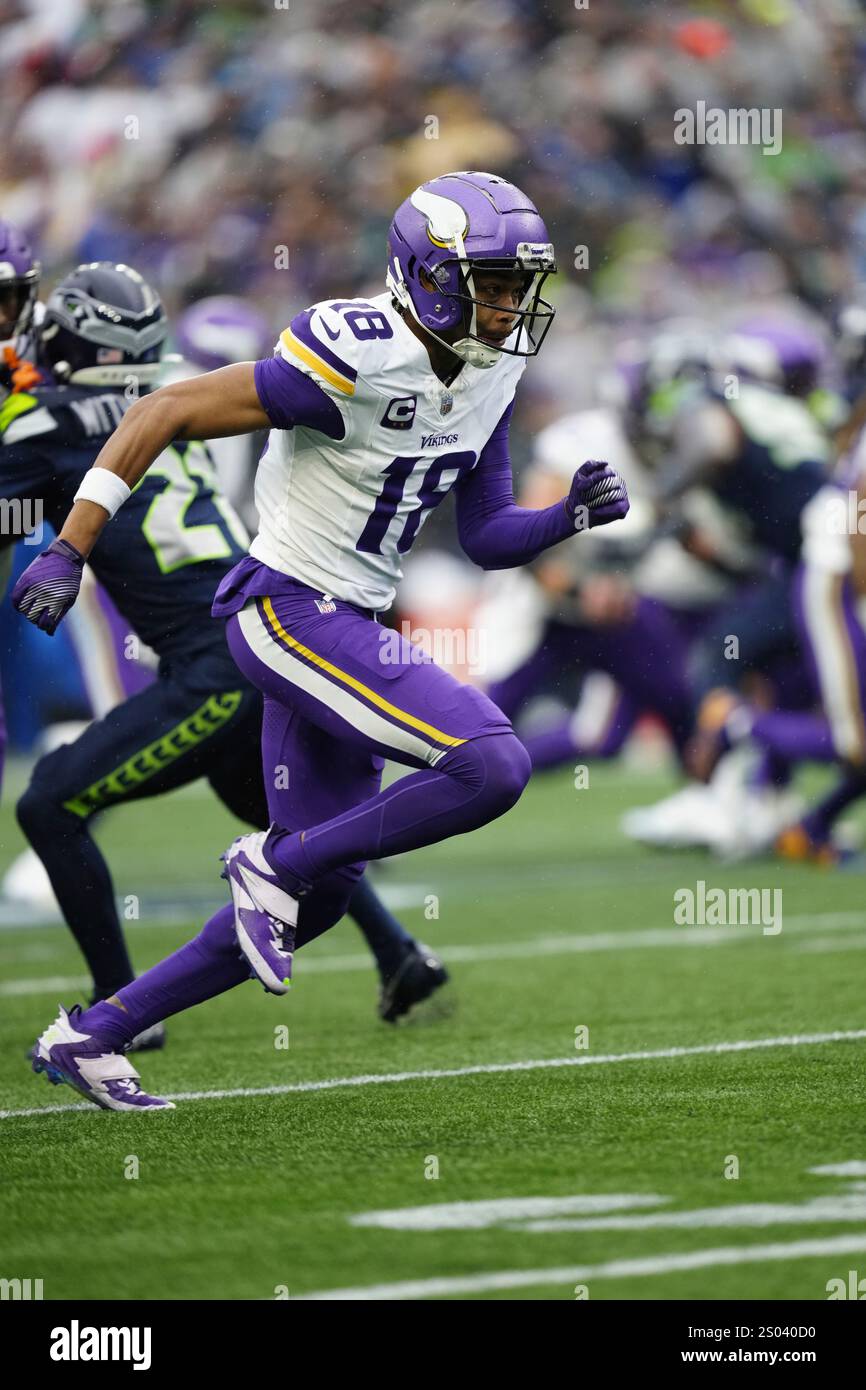 Minnesota Vikings wide receiver Justin Jefferson (18) runs down the