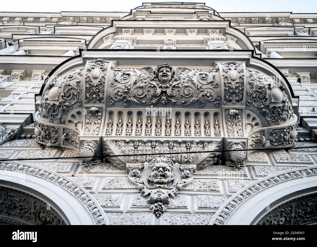 A close-up view of ornate architectural details on a building facade ...