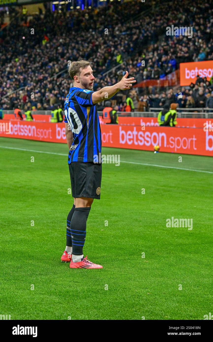 Milano, Italy. 23rd, December 2024. Carlos Augusto (30) of Inter scores