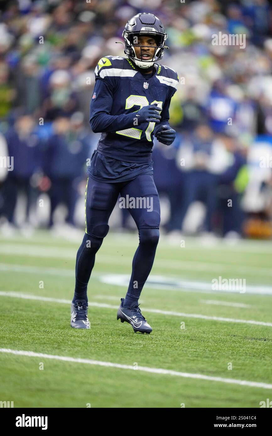 Seattle Seahawks cornerback Devon Witherspoon (21) looks on during an ...