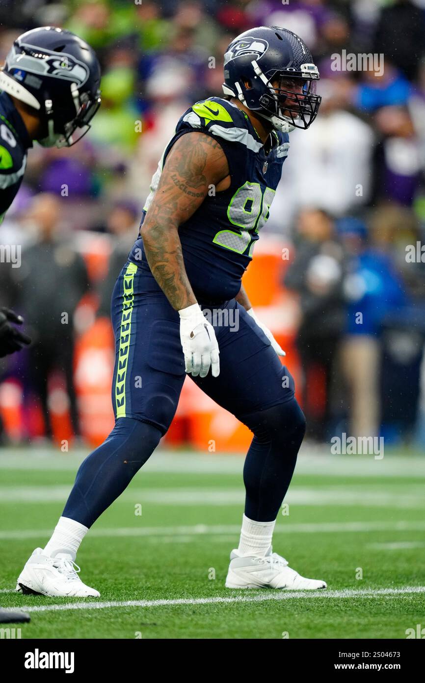 Seattle Seahawks defensive end Leonard Williams (99) gets set during an