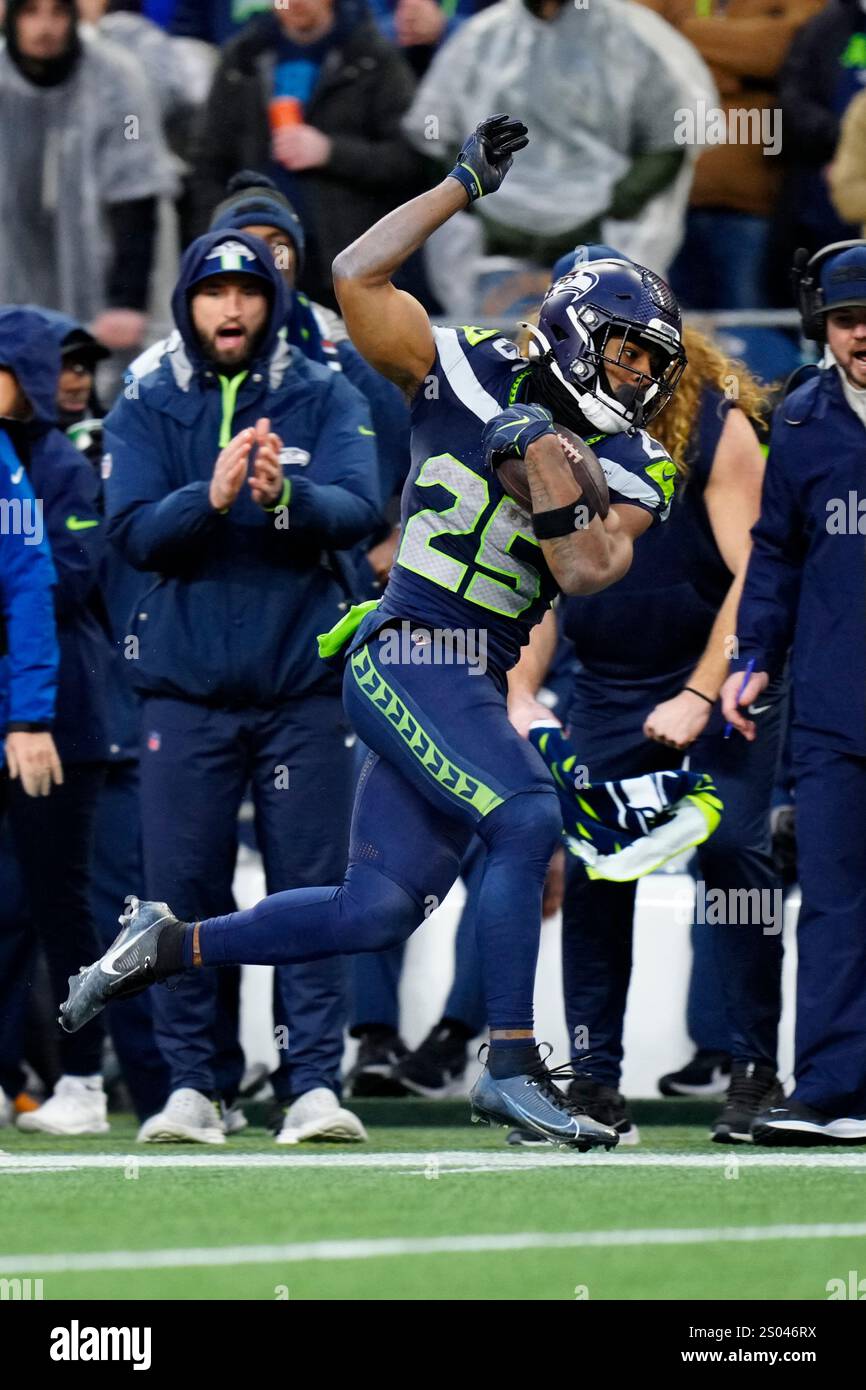 Seattle Seahawks running back Kenny McIntosh (25) runs with the ball