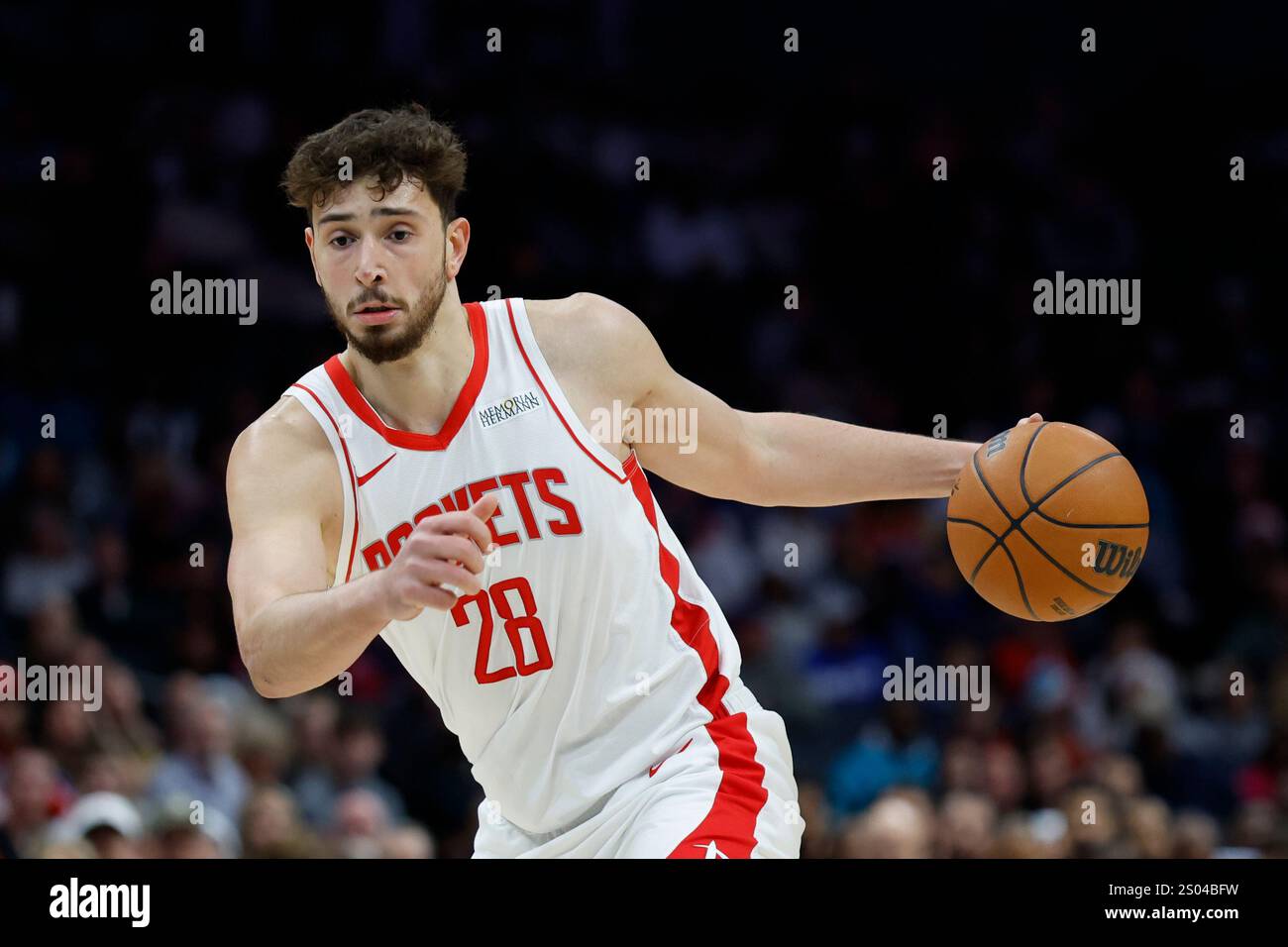 Redmon Rockets Houston Rockets center Alperen Sengun moves the ball during the first ...