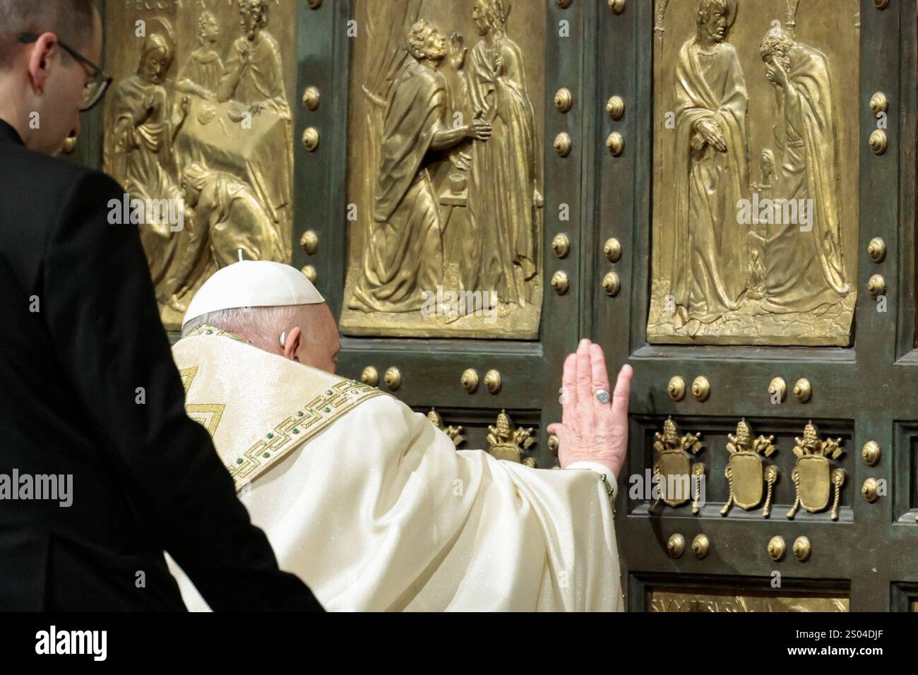 Pope Francis opens the Holy Door to mark the opening of the 2025 ...