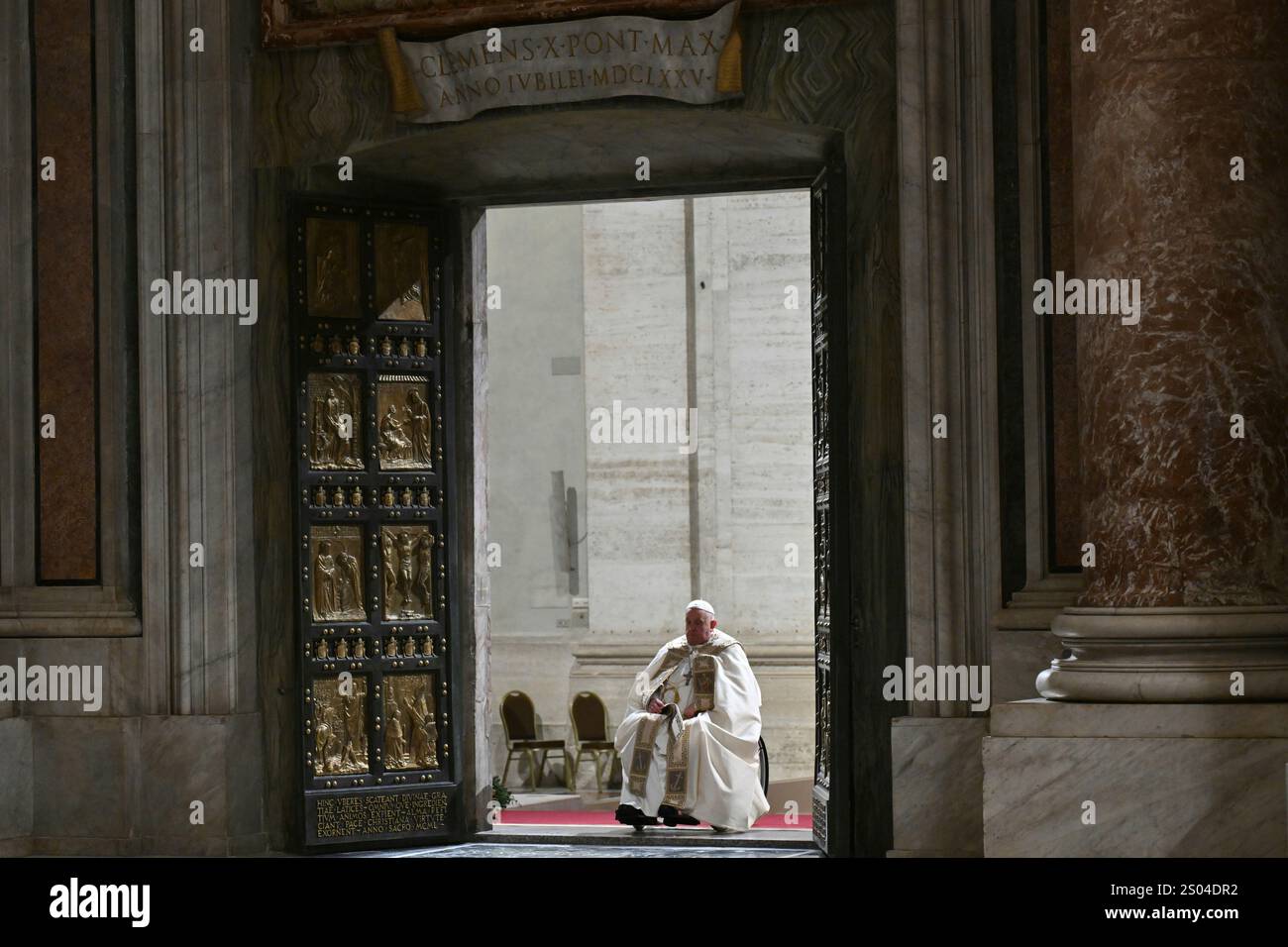 Pope Francis opens the Holy Door of St Peter's Basilica to mark the ...